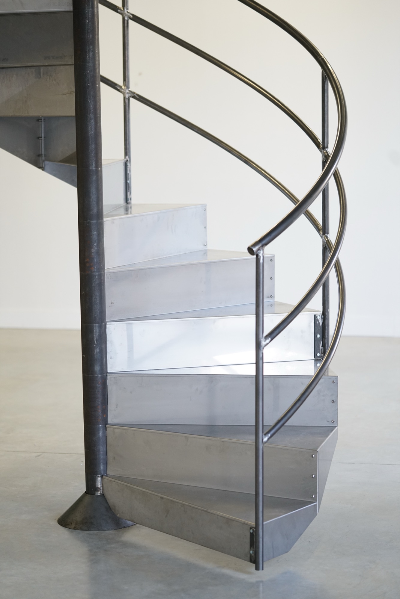 spinning staircase — staircase set into rotation by walking